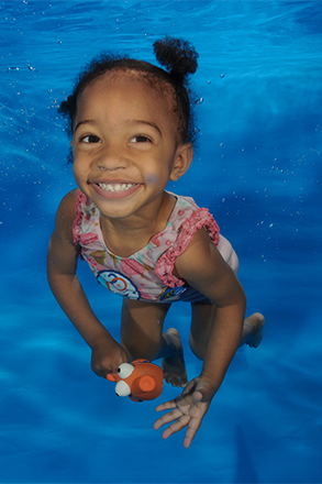 girl toddler at a water babies underwater photoshoot