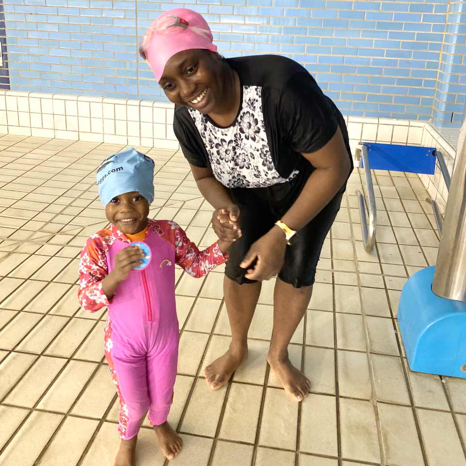 janet and her daughter at a water babies lesson