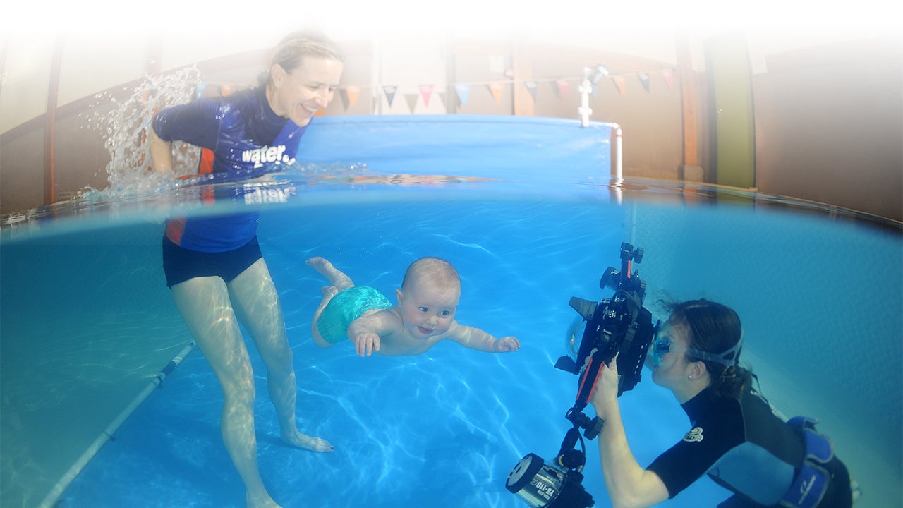 water babies dipper and photographer at underwater photoshoot
